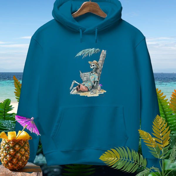 Teal hoodie with skeleton reading "How to Relax" on a beach.