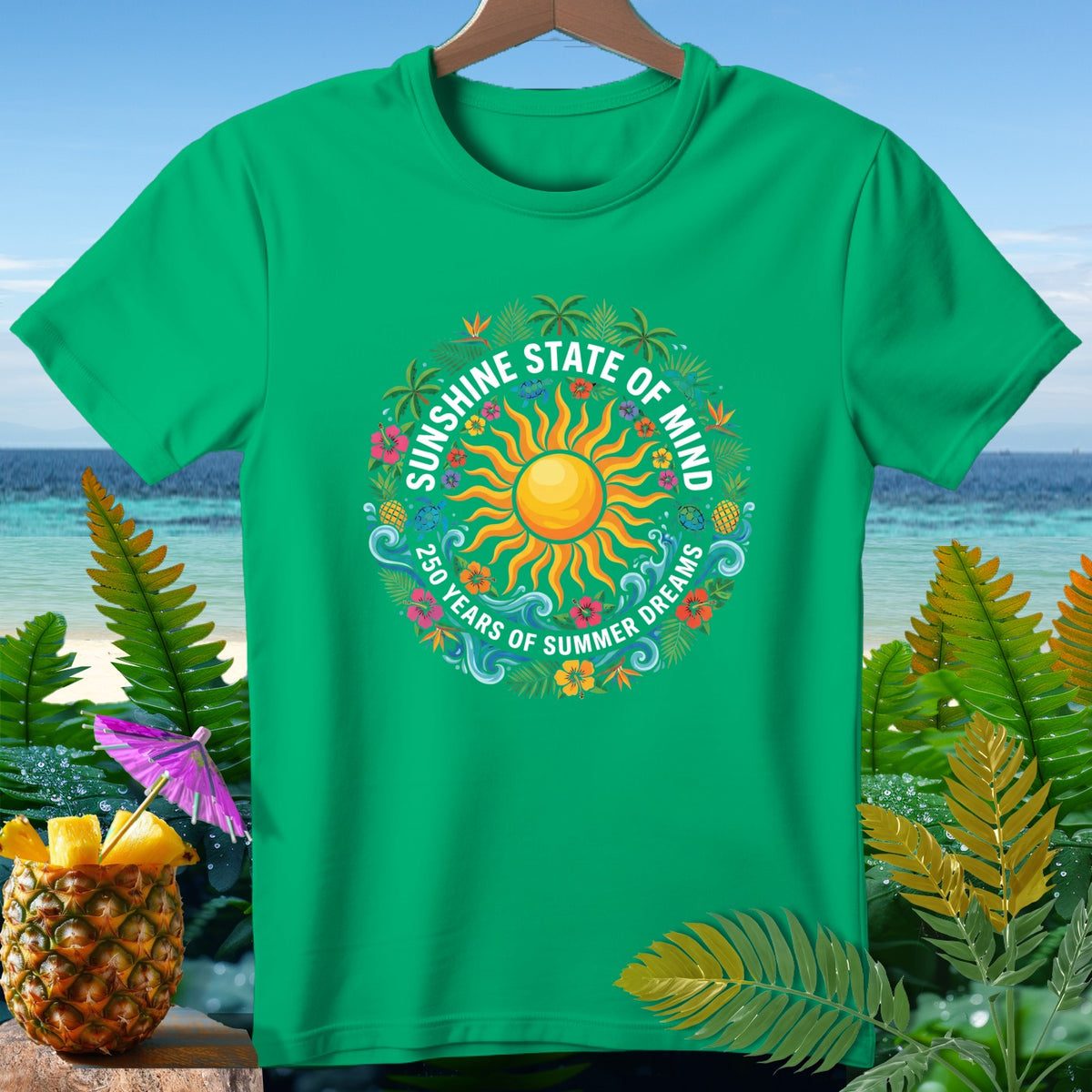 Green t-shirt with circular "Sunshine State of Mind 250 Years of Summer Dreams" graphic.