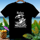 Black t-shirt with a pelican on a lounge chair under an umbrella, text 