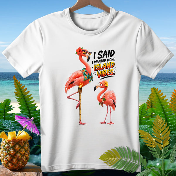 Two flamingos, one large, one small, with text "I SAID I WANTED MORE ISLAND VIBES".
