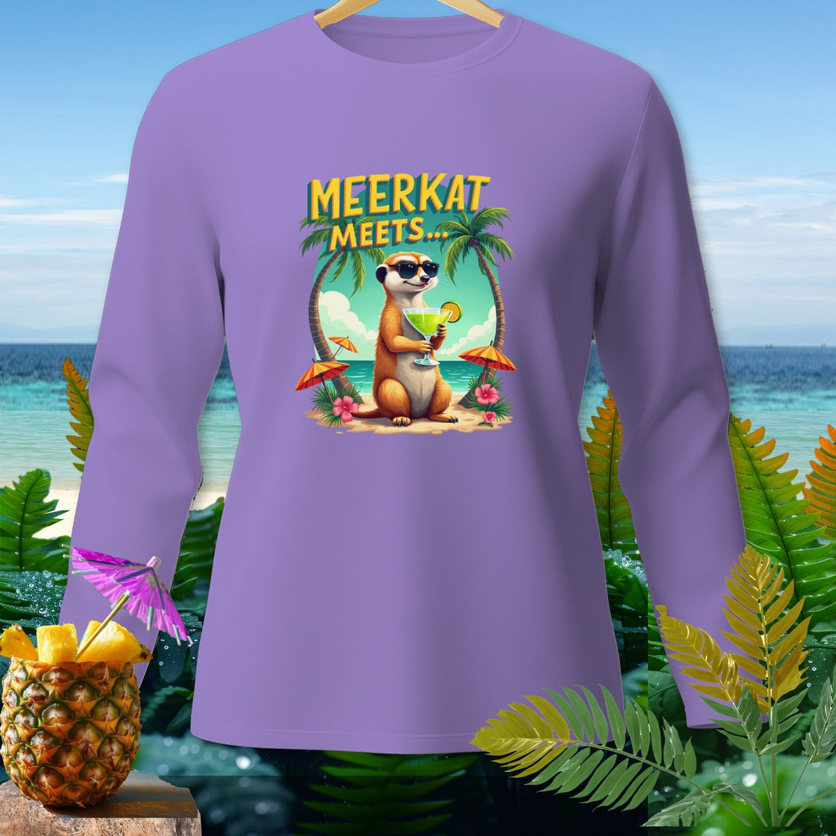 Long-sleeve purple shirt with "Meerkat Meets..." text and meerkat on beach graphic.