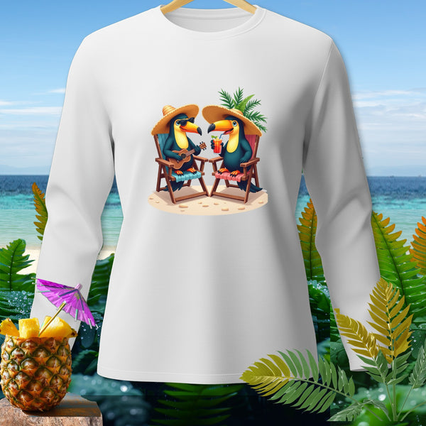White long-sleeve shirt with cartoon toucans on a beach wearing straw hats.