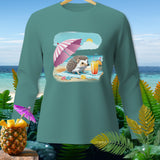 Long-sleeve shirt with a cartoon hedgehog enjoying a beach drink under an umbrella.