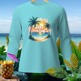Blue long-sleeve shirt with tropical beach graphic and 