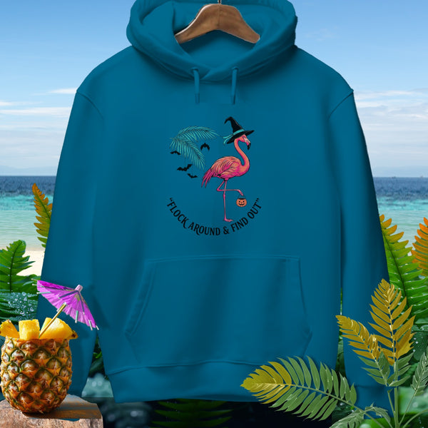 Teal hoodie with flamingo wearing witch hat and carrying pumpkin.