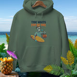 Green hoodie with graphic of skeleton holding surfboard and pumpkin, text 