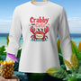 White long-sleeve shirt with a cartoon crab graphic that reads "Crabby but Cute" and "Hug me!".
