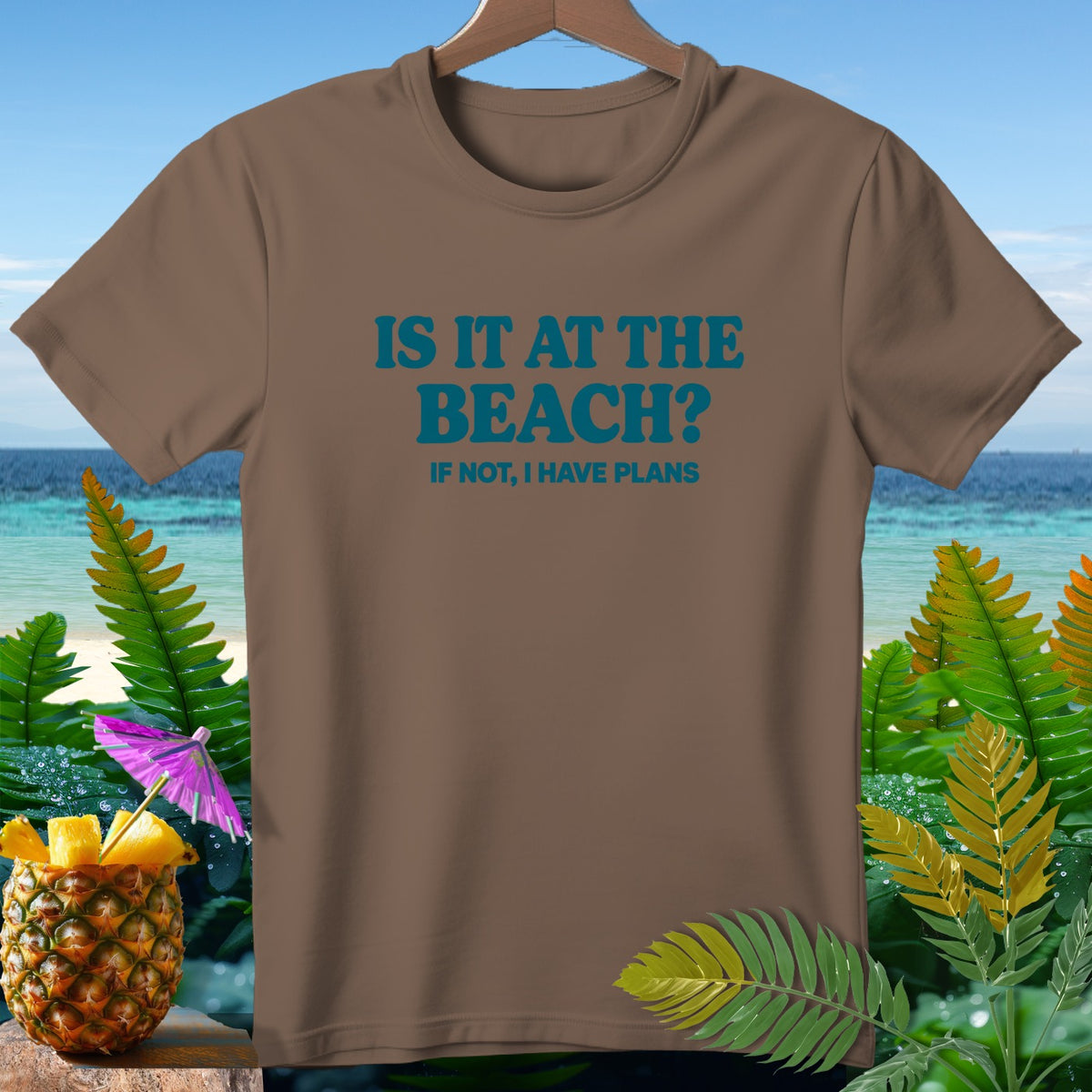 Brown t-shirt with blue text "IS IT AT THE BEACH? IF NOT, I HAVE PLANS".
