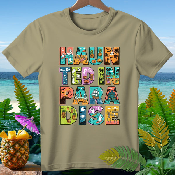 T-shirt with colorful "Haunted in Paradise" text featuring Halloween and beach elements.