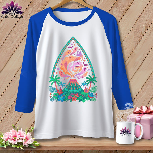 White raglan t-shirt with volcano, ghosts, bats, and tropical flowers graphic.