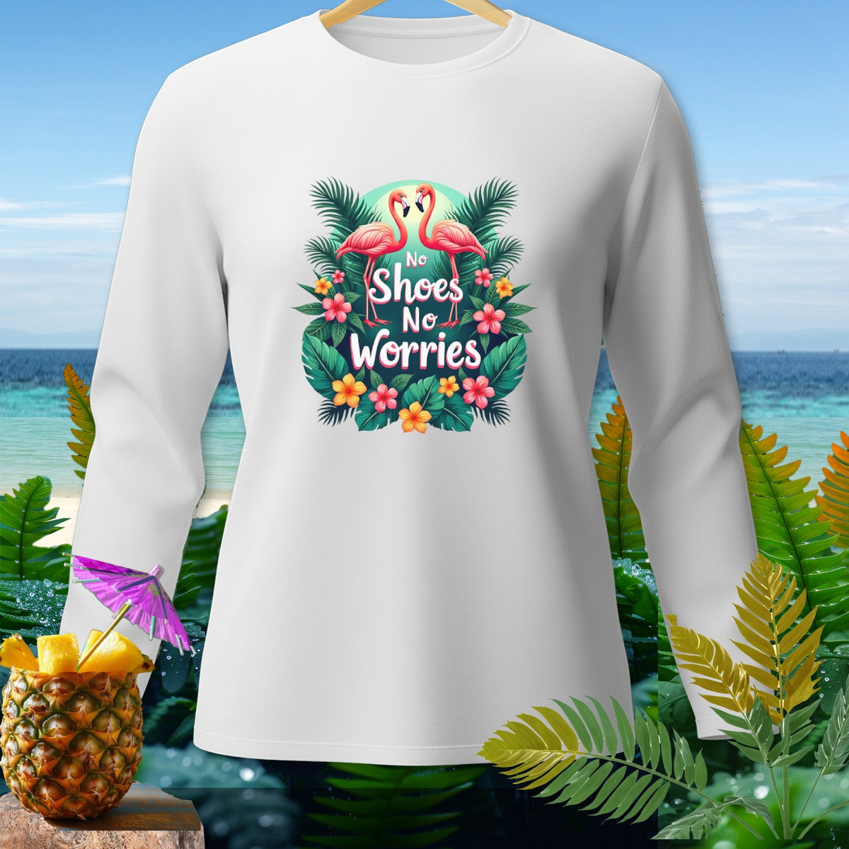 White long-sleeve shirt with flamingos and text "No Shoes No Worries".