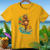 Yellow t-shirt with graphic of bear meditating on surfboard with crab and tropical background.