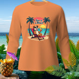 Orange long-sleeve shirt with graphic of dog relaxing on beach with text 