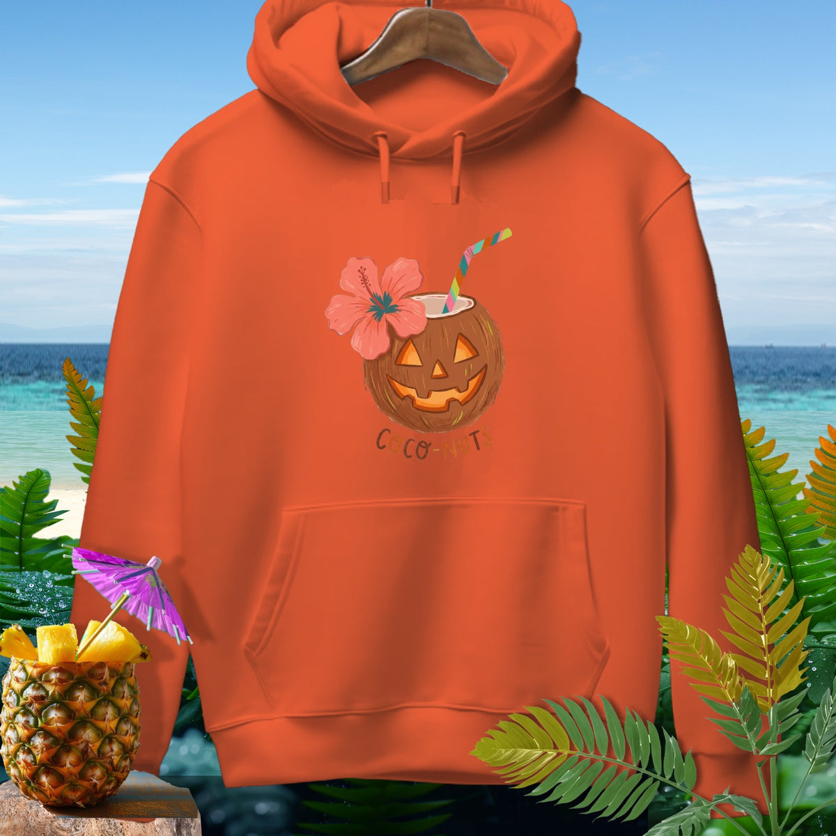 Orange hoodie with jack-o'-lantern coconut graphic and "Coco-Nuts" text.