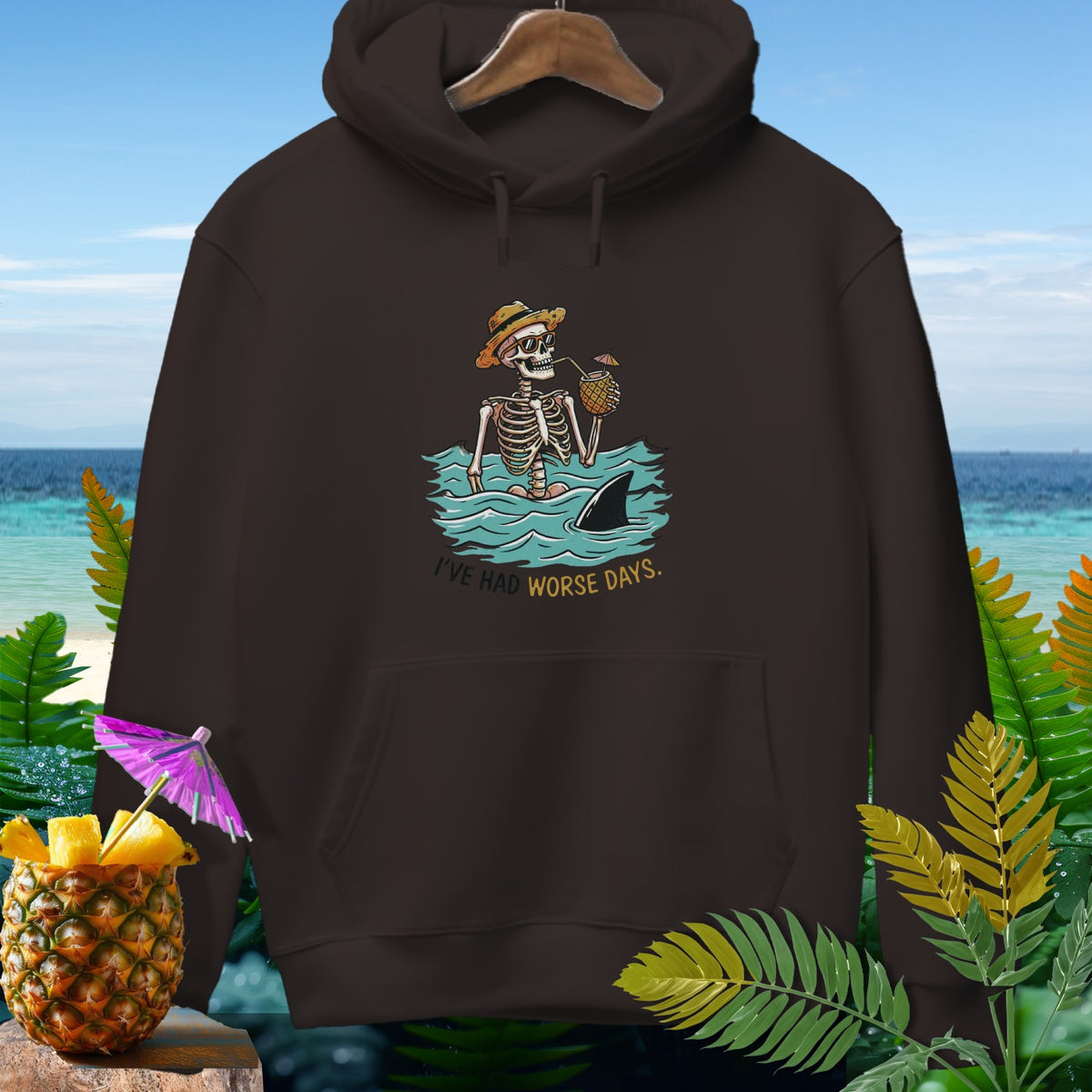 Brown hoodie with skeleton, shark fin, and text "I'VE HAD WORSE DAYS."