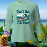 Light green long-sleeve shirt with octopus surfing, text 