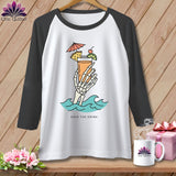 Skeleton hand holding a tropical drink, with 
