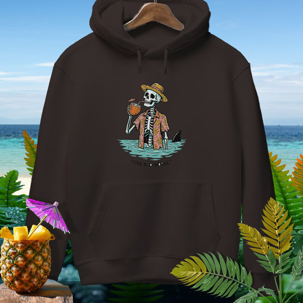 Dark brown hoodie with skeleton on beach graphic and text "I'VE HAD WORSE."