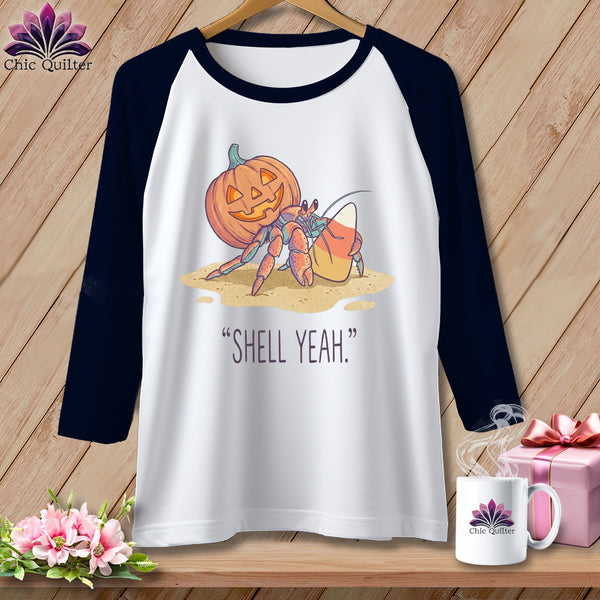 Hermit crab with pumpkin and candy corn, "SHELL YEAH." text.