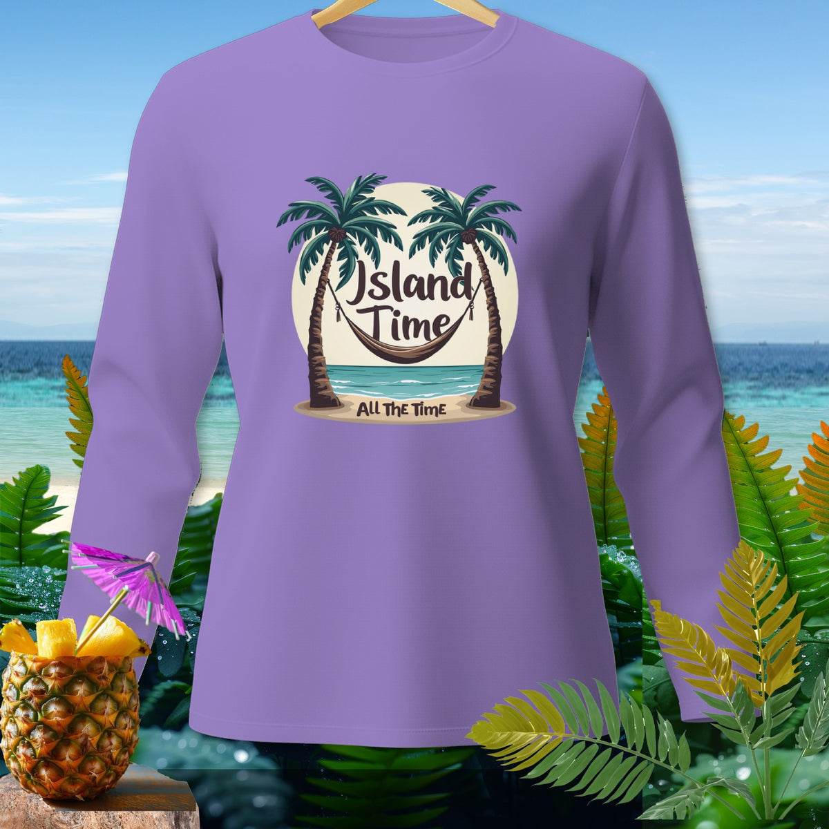 Purple long-sleeve shirt with "Island Time All The Time" graphic on beach scene.