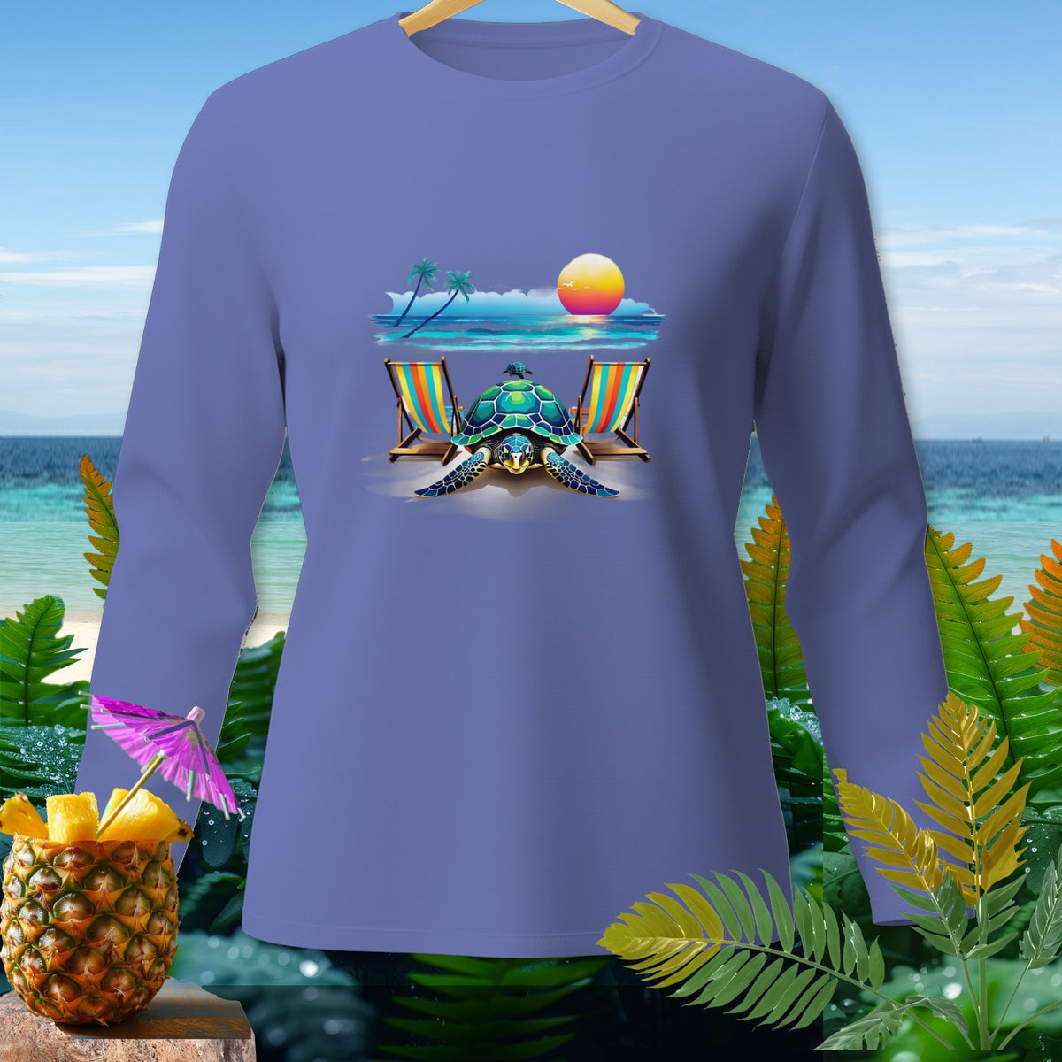 Purple long sleeve shirt with turtle and beach scene graphic.