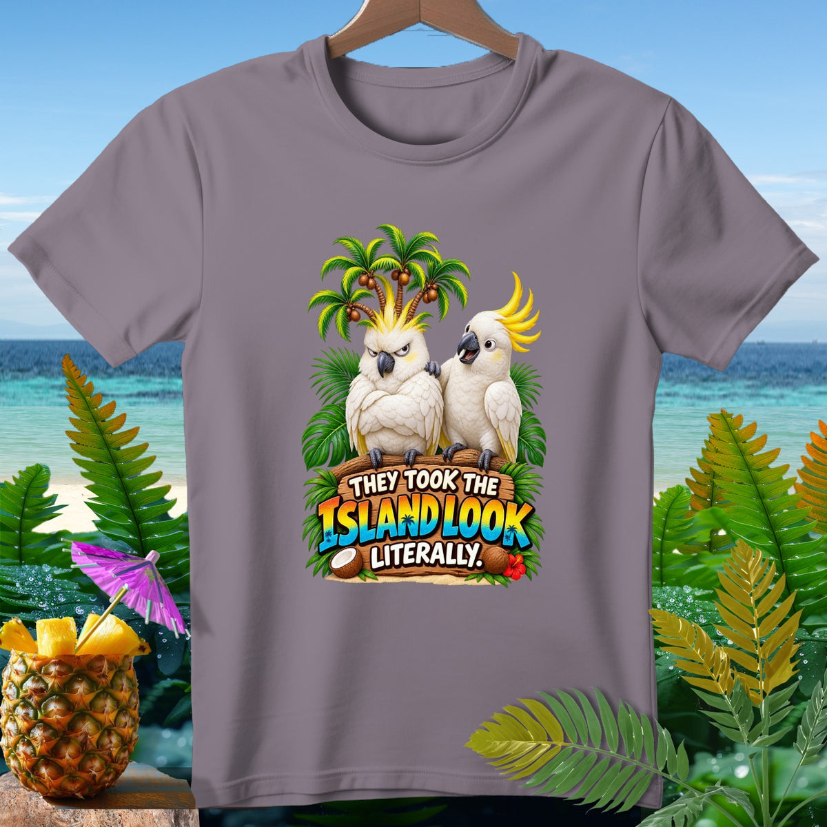 Two cockatoos with palm trees on their heads and text "THEY TOOK THE ISLAND LOOK LITERALLY."