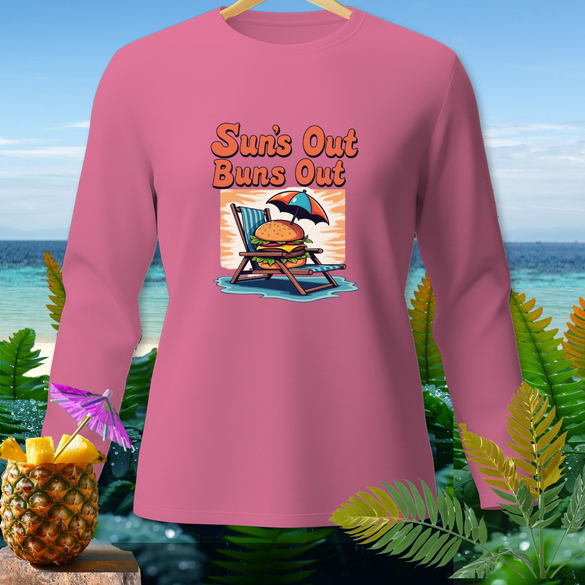 Pink long-sleeve shirt with "Sun's Out Buns Out" text and burger graphic.