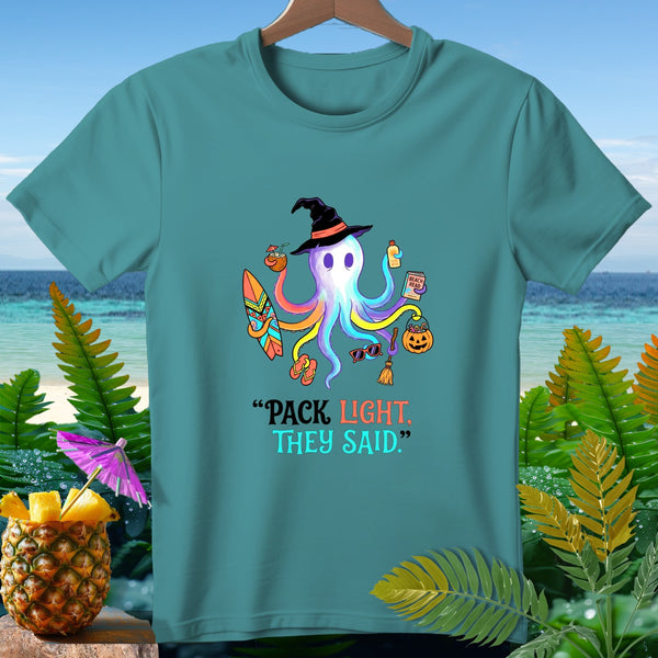 T-shirt with a rainbow octopus wearing a witch hat and holding beach items.