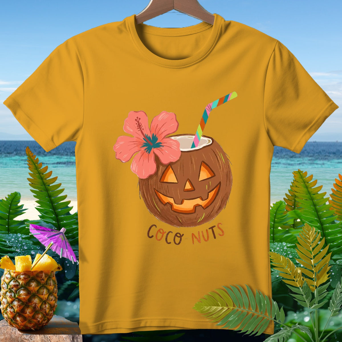 Yellow t-shirt with jack-o'-lantern coconut and "Coco Nuts" text.