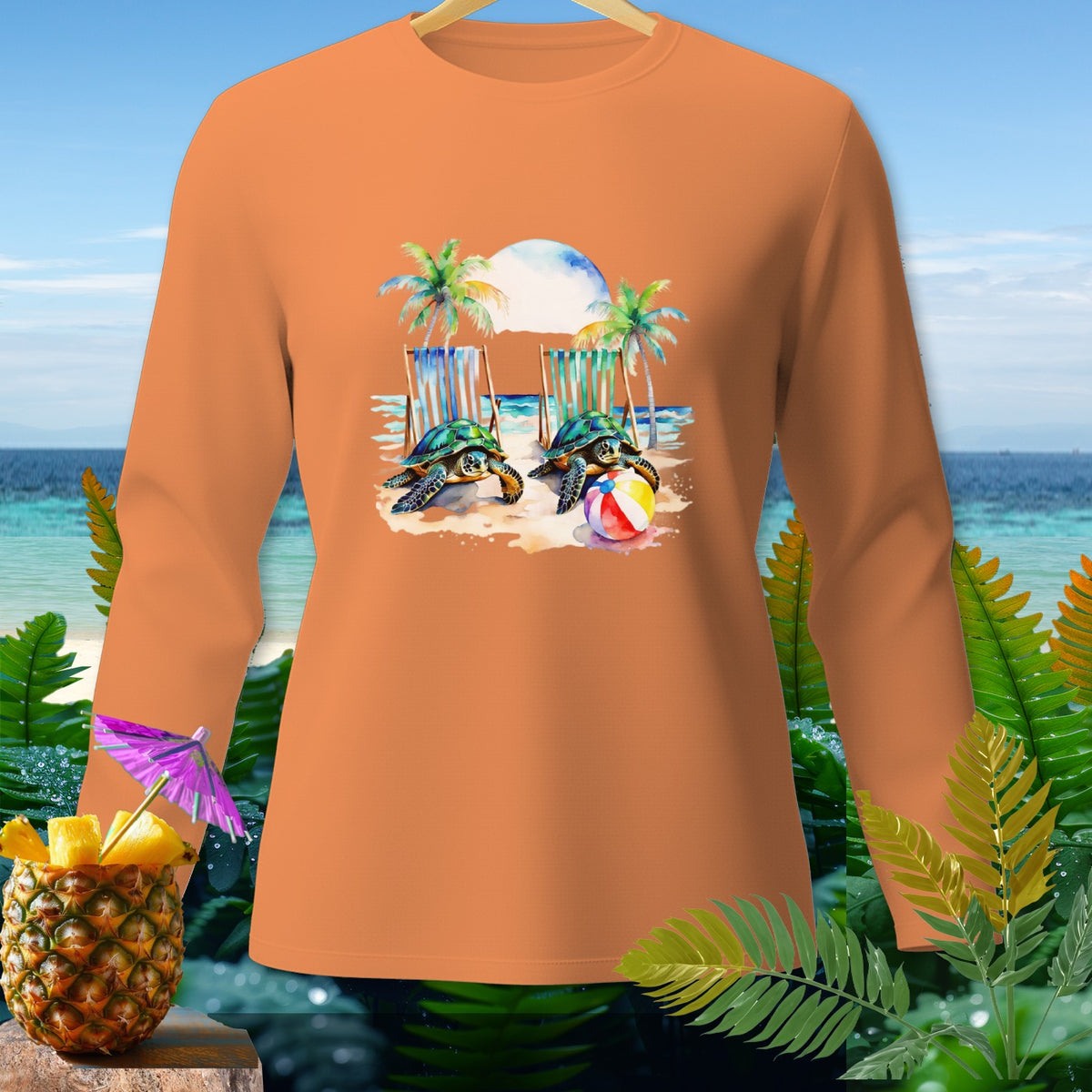 Orange long sleeve shirt with two turtles and beach scene graphic.