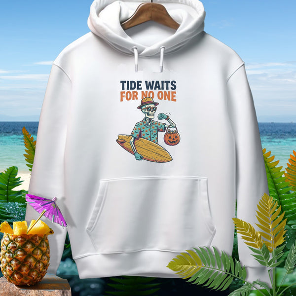 White hoodie featuring a skeleton surfer graphic with the text "Tide Waits For No One".