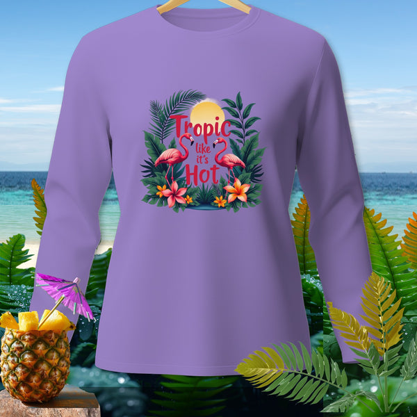 Lavender long-sleeve shirt with flamingos, tropical leaves, and text "Tropic like it's Hot."