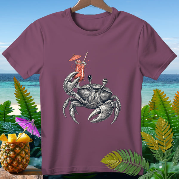 Crab holding a tropical cocktail on a plum t-shirt with beach and pineapple background.