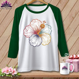 White baseball tee with colorful hibiscus, ghosts, and a jack-o-lantern.