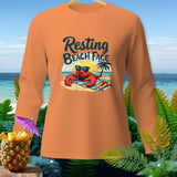 Orange long-sleeve shirt with a lobster on a beach graphic that reads 