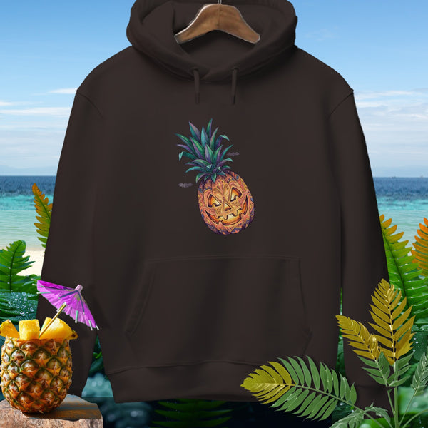 Brown hoodie with a Halloween pineapple graphic and a beach background.