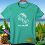 Teal t-shirt with white wave and hibiscus graphic, text 