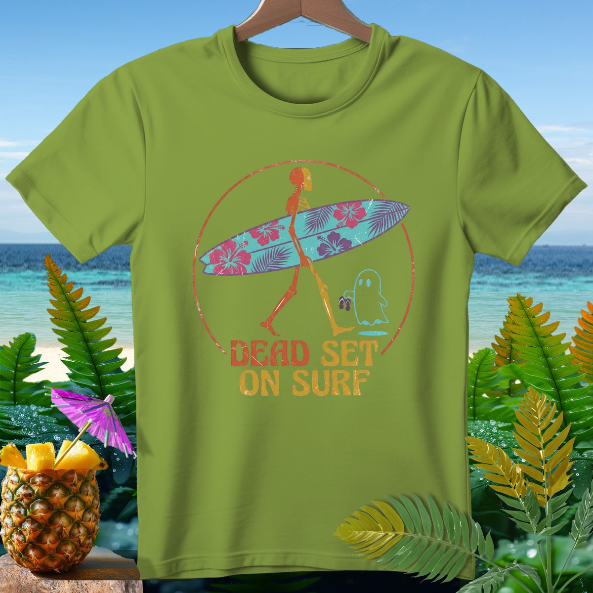 Skeleton with surfboard and ghost graphic with text "Dead Set On Surf".