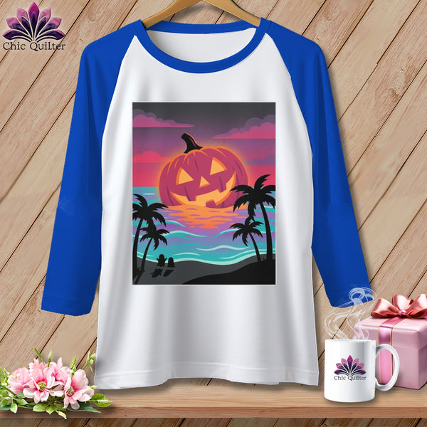 White baseball t-shirt with a jack-o'-lantern on a tropical beach at sunset graphic.