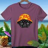 Black pug wearing a floral bucket hat on a plum t-shirt with beach background.