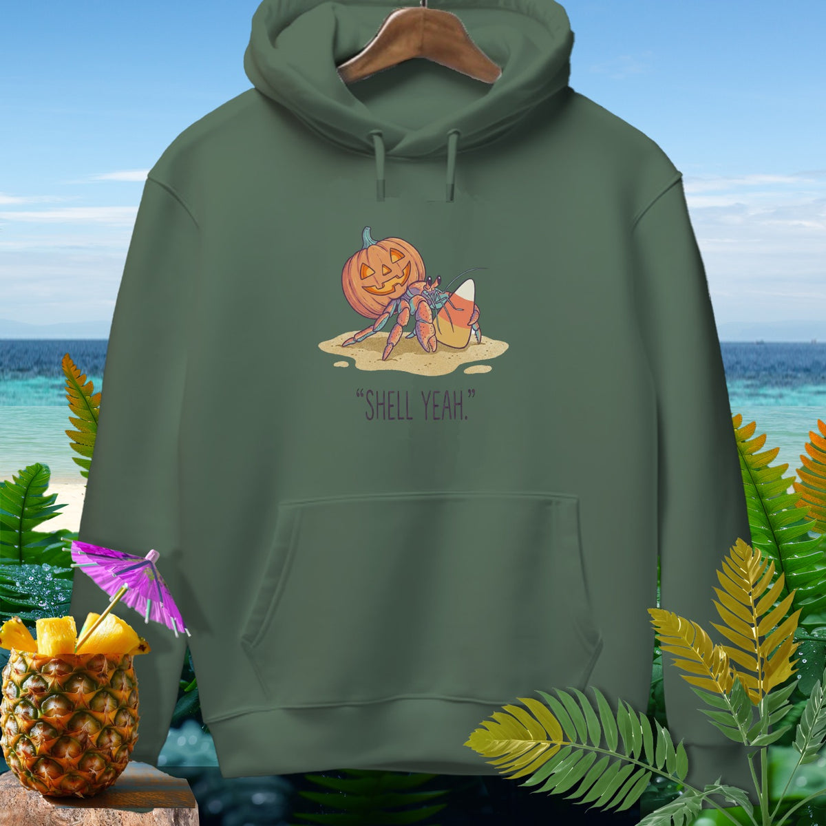 Hermit crab with pumpkin and candy corn saying "Shell Yeah" on hoodie.