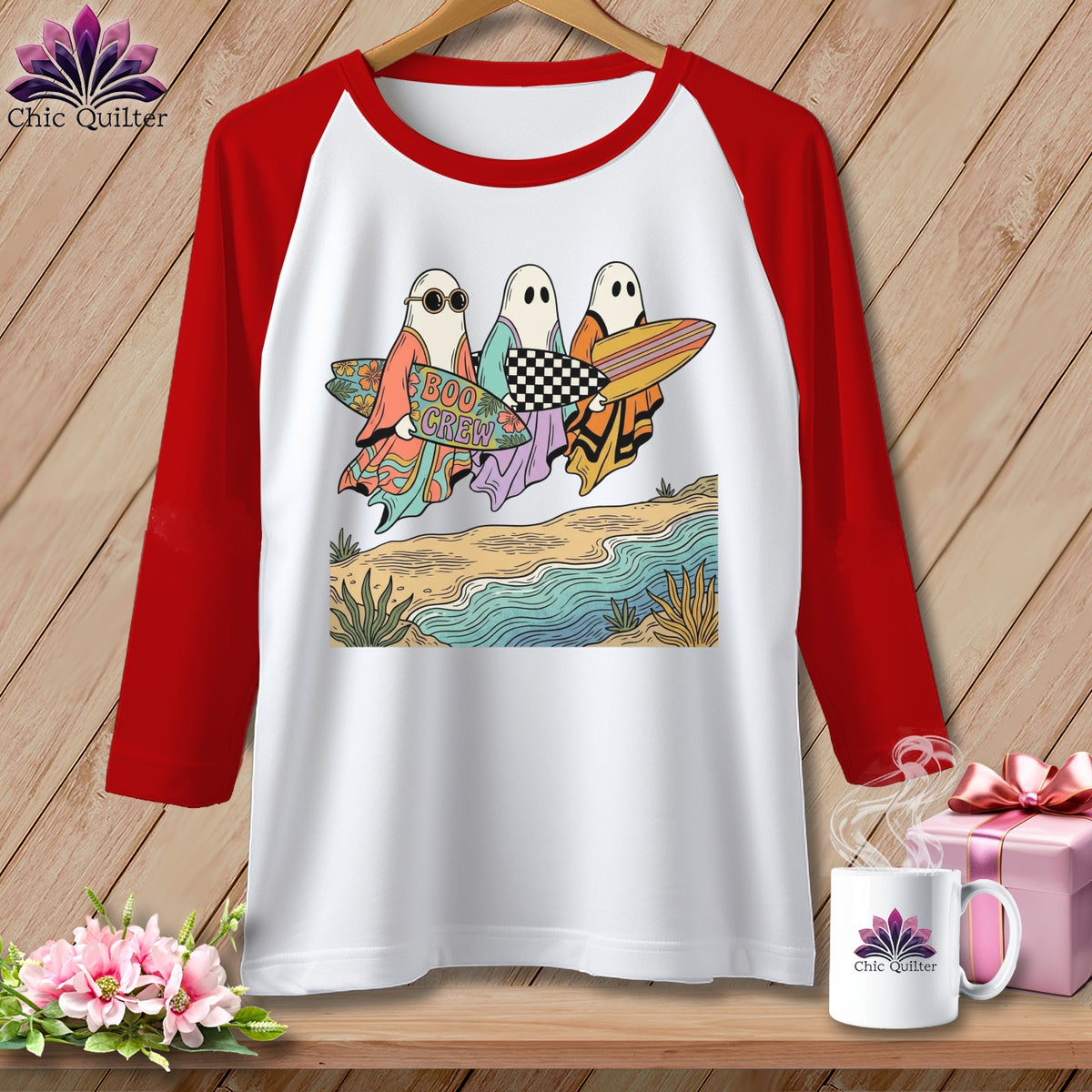 White raglan t-shirt with "Boo Crew" ghost graphic holding surfboards on a beach.