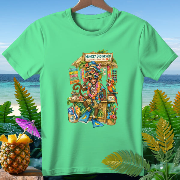 Monkey wearing sunglasses and lei at a stand labeled "Monkey Business."