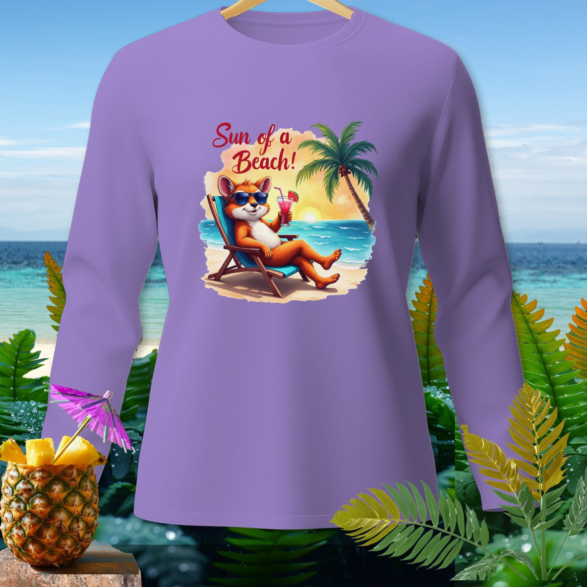 Lilac long sleeve shirt with cartoon fox on beach graphic and text "Sun of a Beach!"