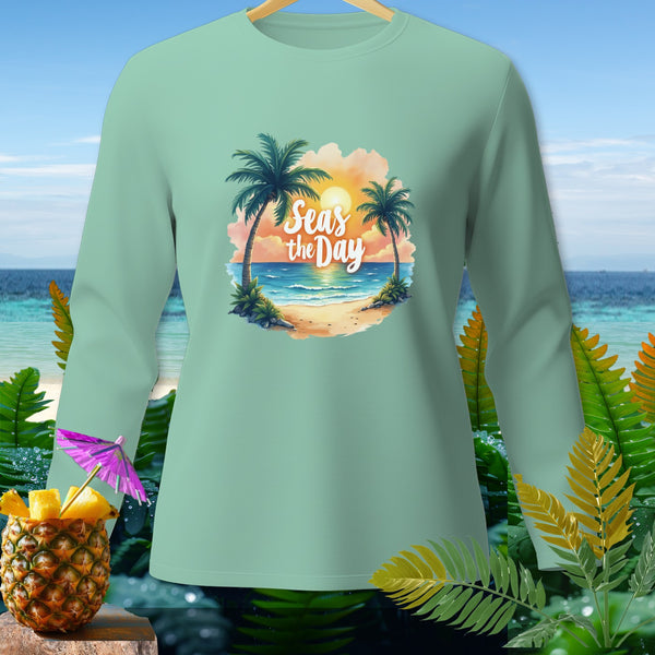 Light green long-sleeved shirt with "Seas the Day" beach graphic and pineapple cocktail.