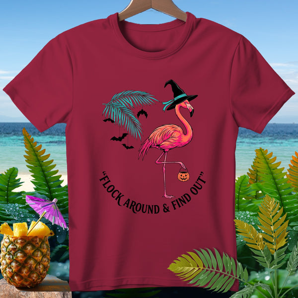 Maroon t-shirt with flamingo wearing witch hat and holding pumpkin, "Flock Around & Find Out" text.