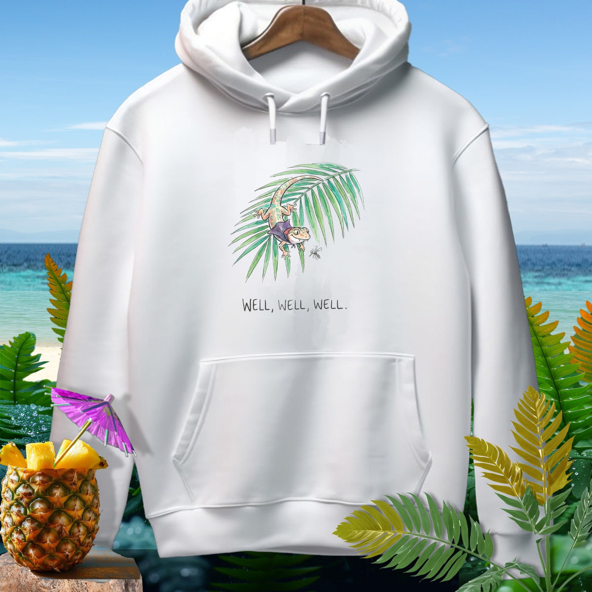 White hoodie with watercolor gecko graphic and text "Well, Well, Well."