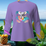 Purple long-sleeve shirt with a koala in a hammock drinking juice.
