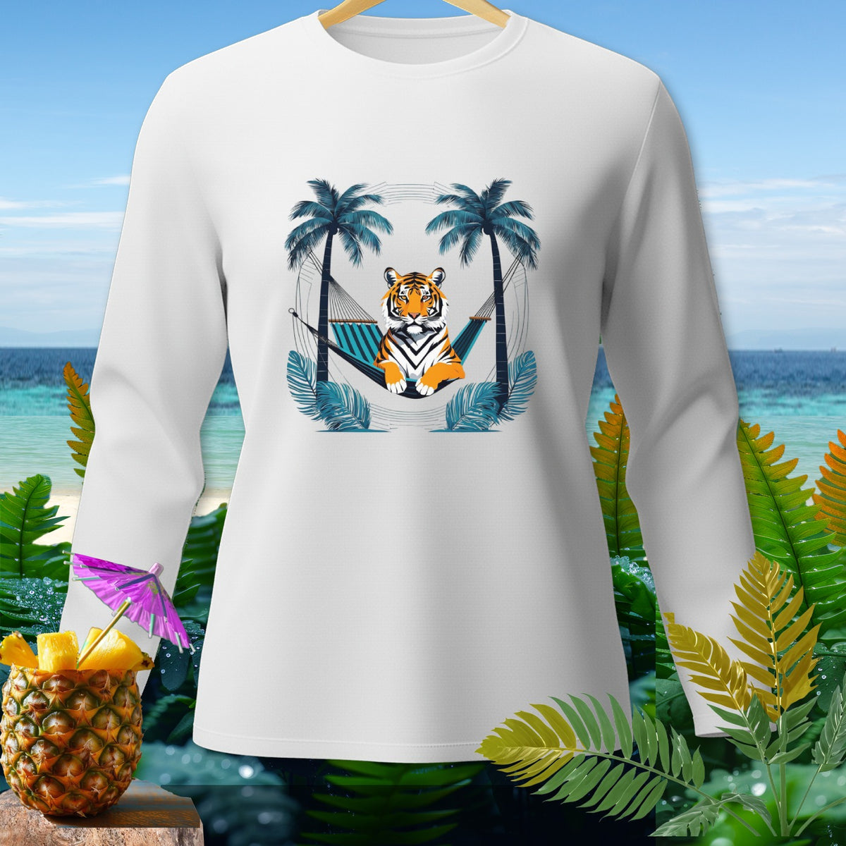 White long-sleeve shirt with tiger in hammock graphic, tropical background.