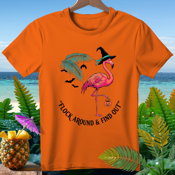 Orange t-shirt with flamingo, witch hat, bats, and "Flock Around & Find Out" text.
